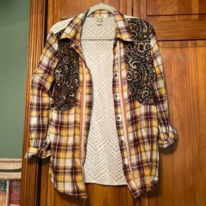 Plaid and print button down with chevron semi sheer back.